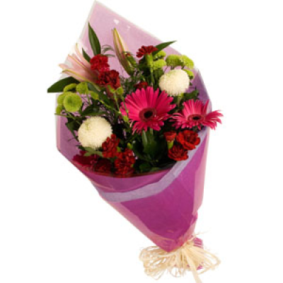 Burleigh Bunch Special - MIXED FLOWERS WRAPPED IN COLOURFUL PAPER ( STEMS IN WATER)