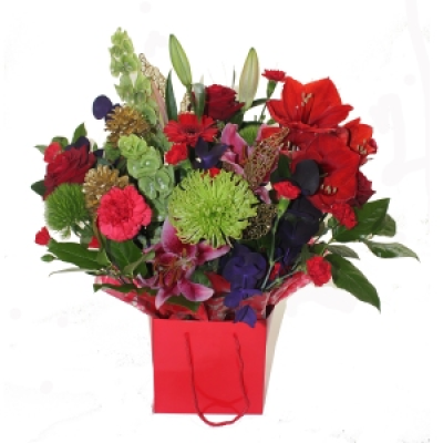 Cherrie - Beautiful cheerful  arrangement full of the best flowers for you to send.