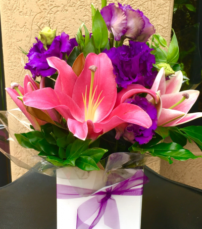 "Pretty Girl" - Special this week for you is a hot pink Lillies and purple lissies in a box