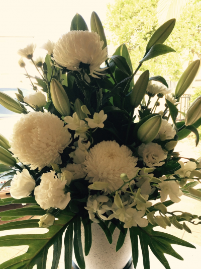 Felicity - A large arrangement of Disbuds, Oriental  lilies, in creams and white.
