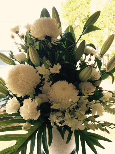 Felicity - A large arrangement of Disbuds, Oriental  lilies, in creams and white.